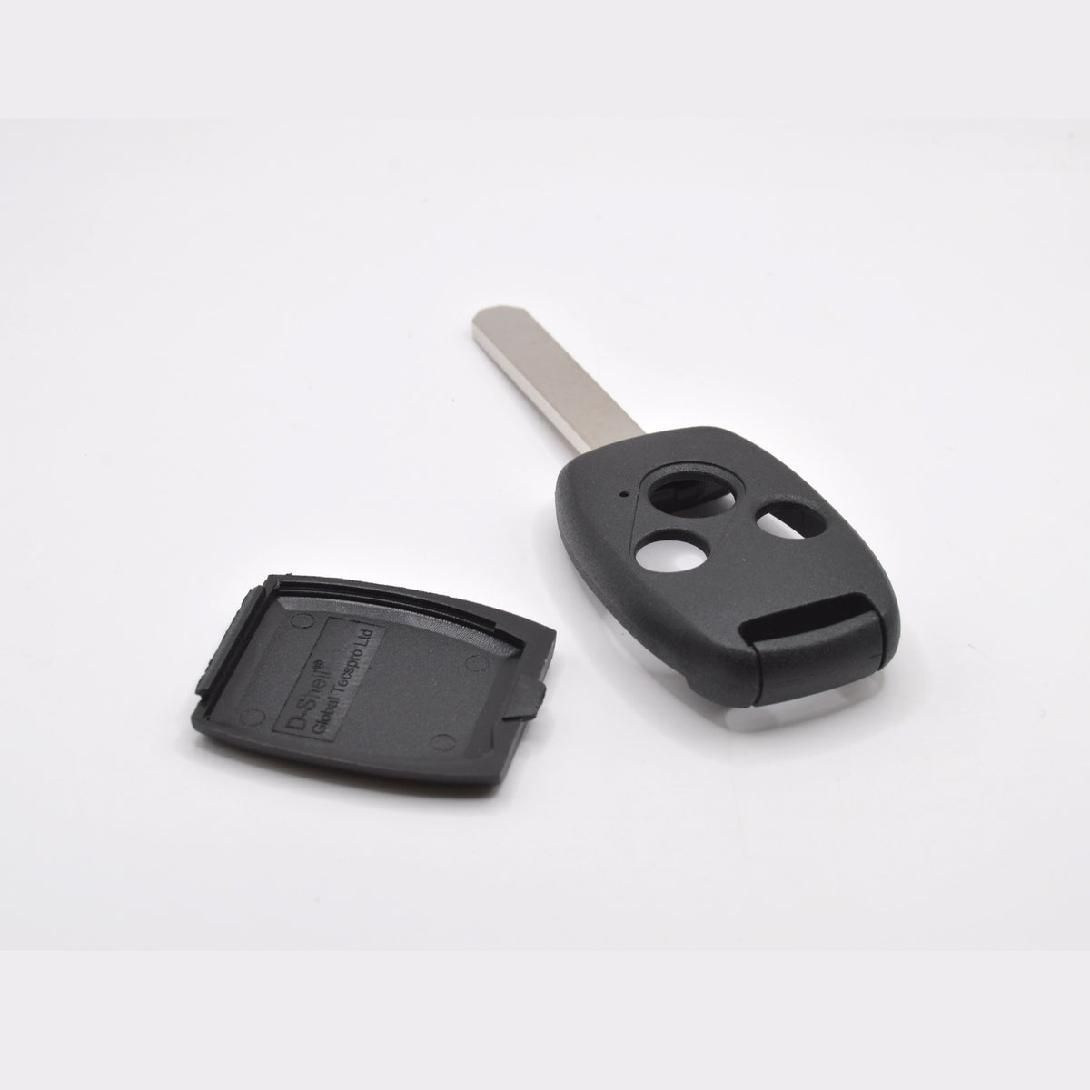 Honda 3 button remote key case opened, showing the inside